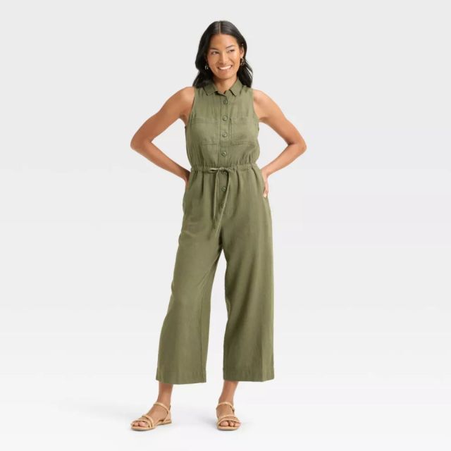 person wearing olive green jumpsuit